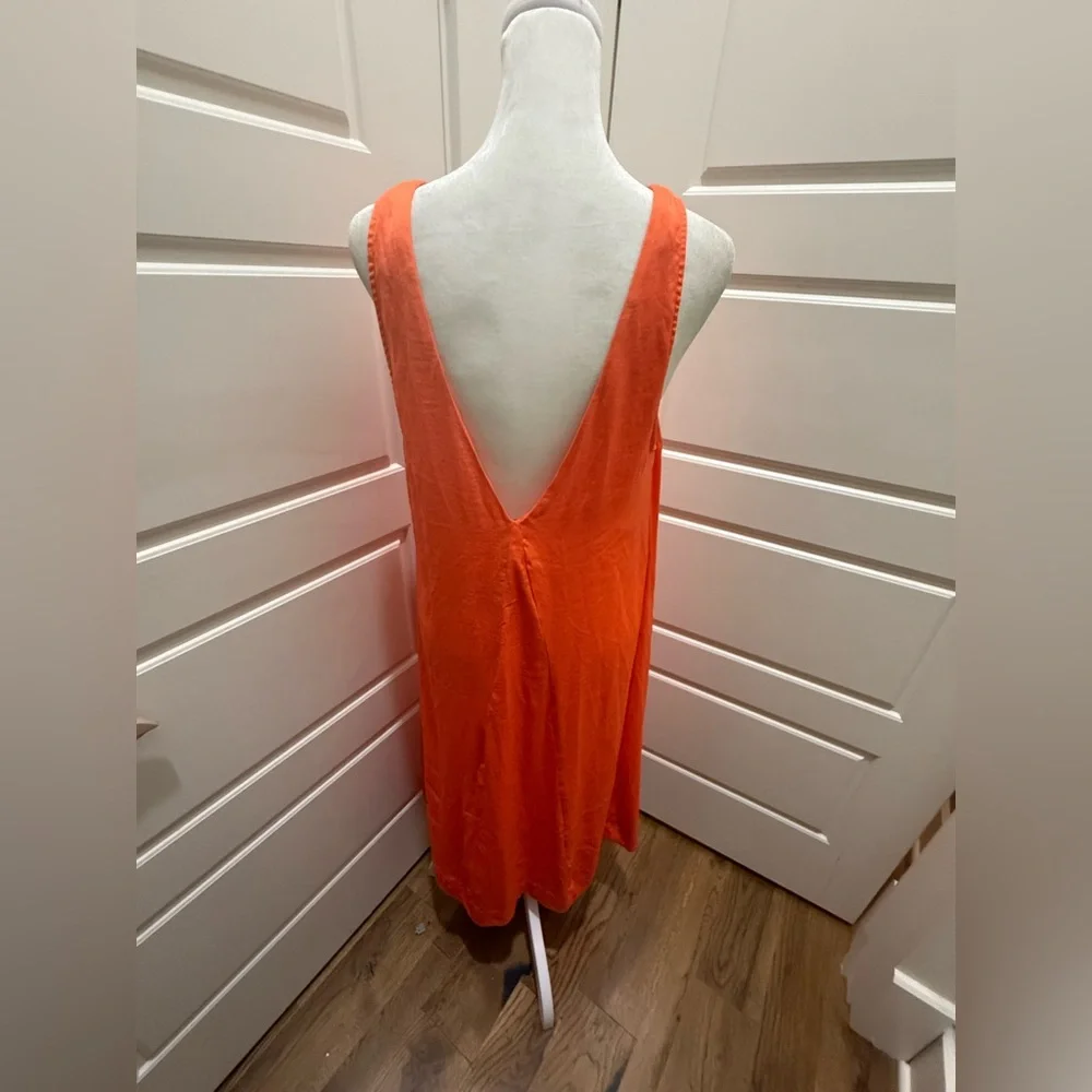 Free People. Orange Long Sleeveless Vneck Front & Back Blouse. Size 12.